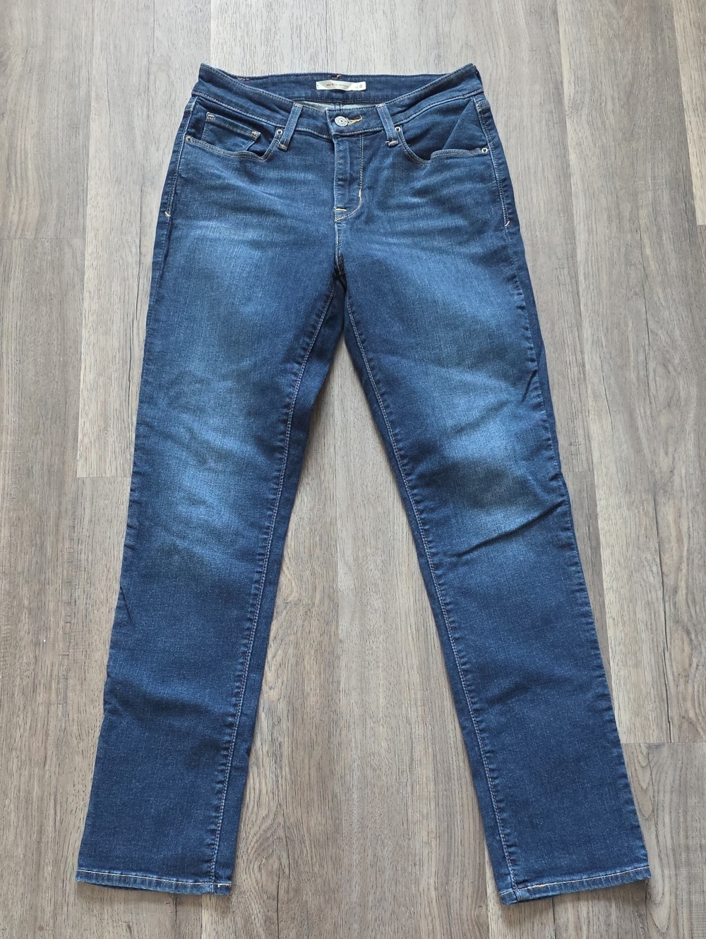 Levi's Women's Mid Rise Skinny Jeans in Dark Blue Wash 8